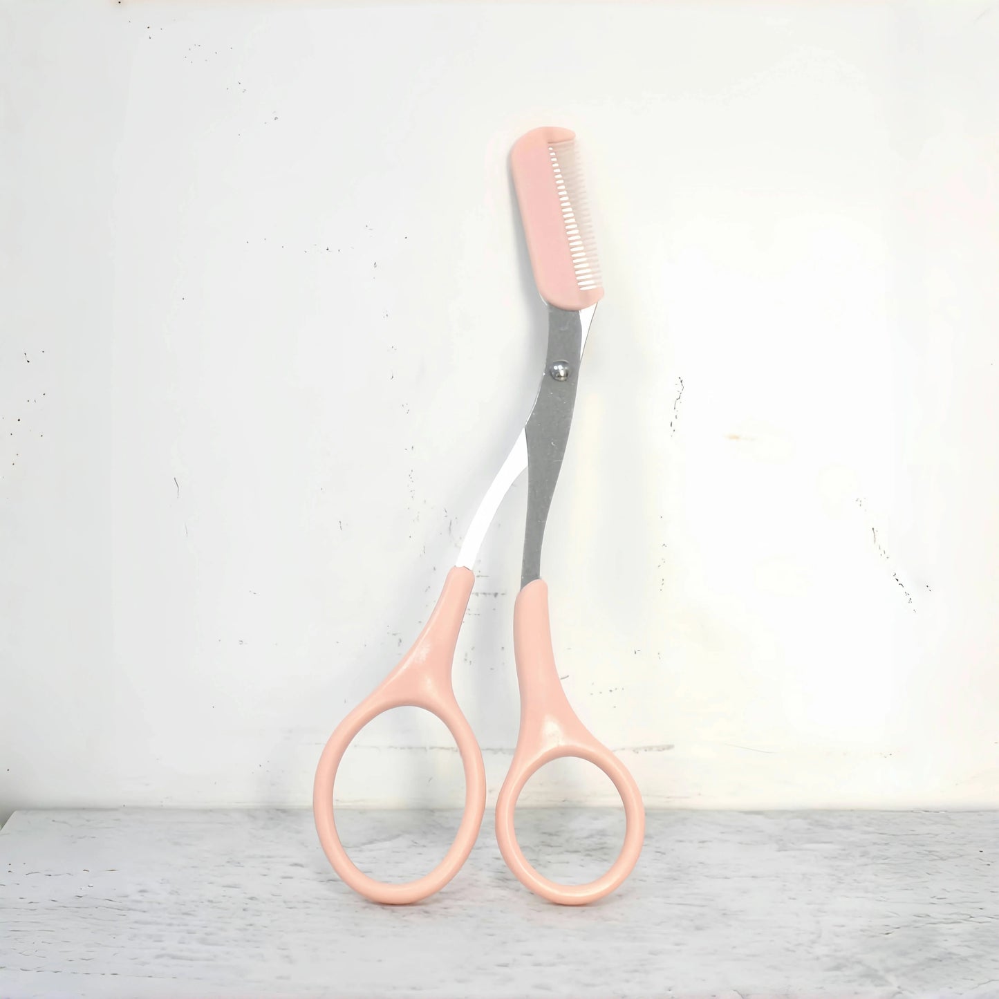 Pink eyebrow trimming scissors with built-in comb - stainless